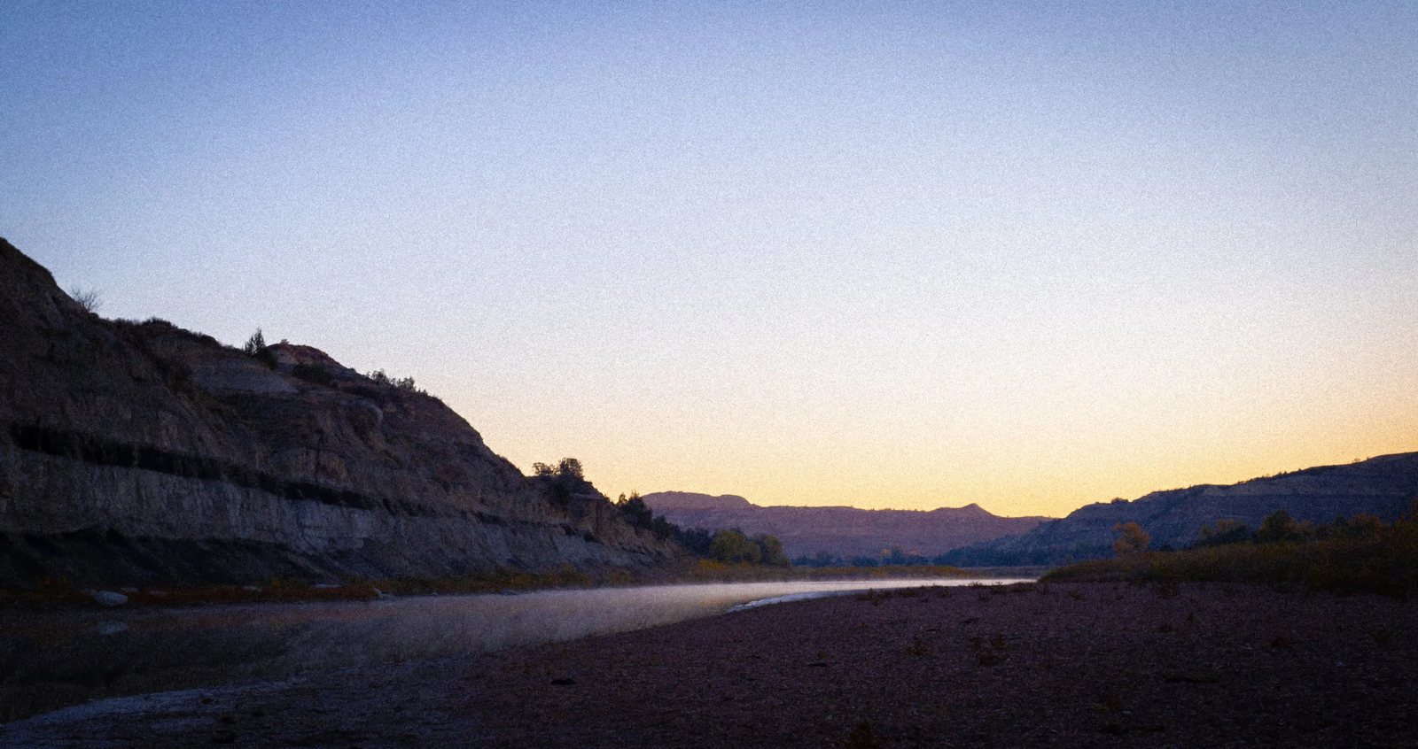 Mist over a river at dawn